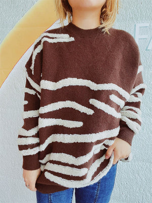 Brown acrylic crewneck sweater with textured white stripes, crewneck, long sleeves.