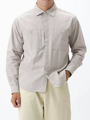 Light gray cotton button-down shirt for men with two chest pockets and button cuffs.