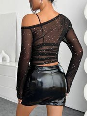 Black dotted mesh asymmetric long sleeve top with a single strap detail.