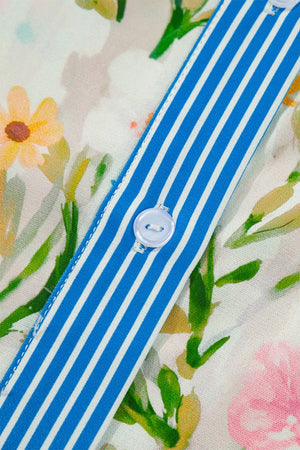 Floral print shift dress with blue and white striped button placket detail.