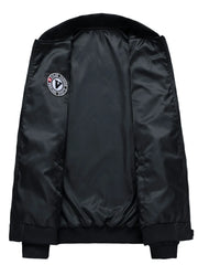 Black bomber jacket with satin lining and embroidered patch detail.