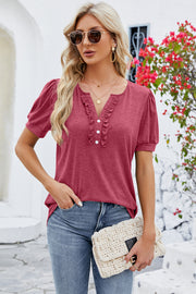 Ruffled placket puff sleeve tee in watermelon pink with a v-neckline and short sleeves.