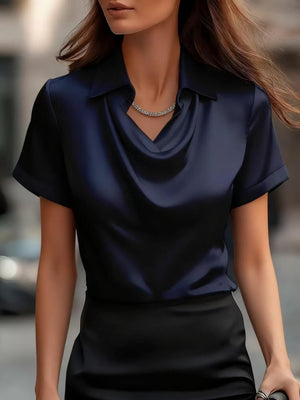 Dark blue satin cowl neck maternity shirt with short sleeves and collar