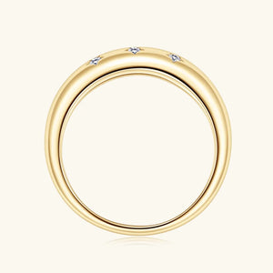 Gold dome ring with scattered starburst diamonds