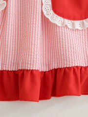 Baby dress with pink and white stripes, red ruffle hem, and white eyelet trim.