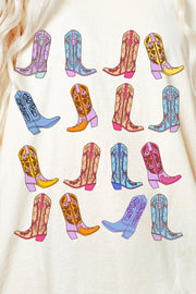 White oversized tee dress with a colorful boot print pattern.