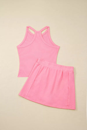 Pink ribbed cropped tank top and pocketed skort set