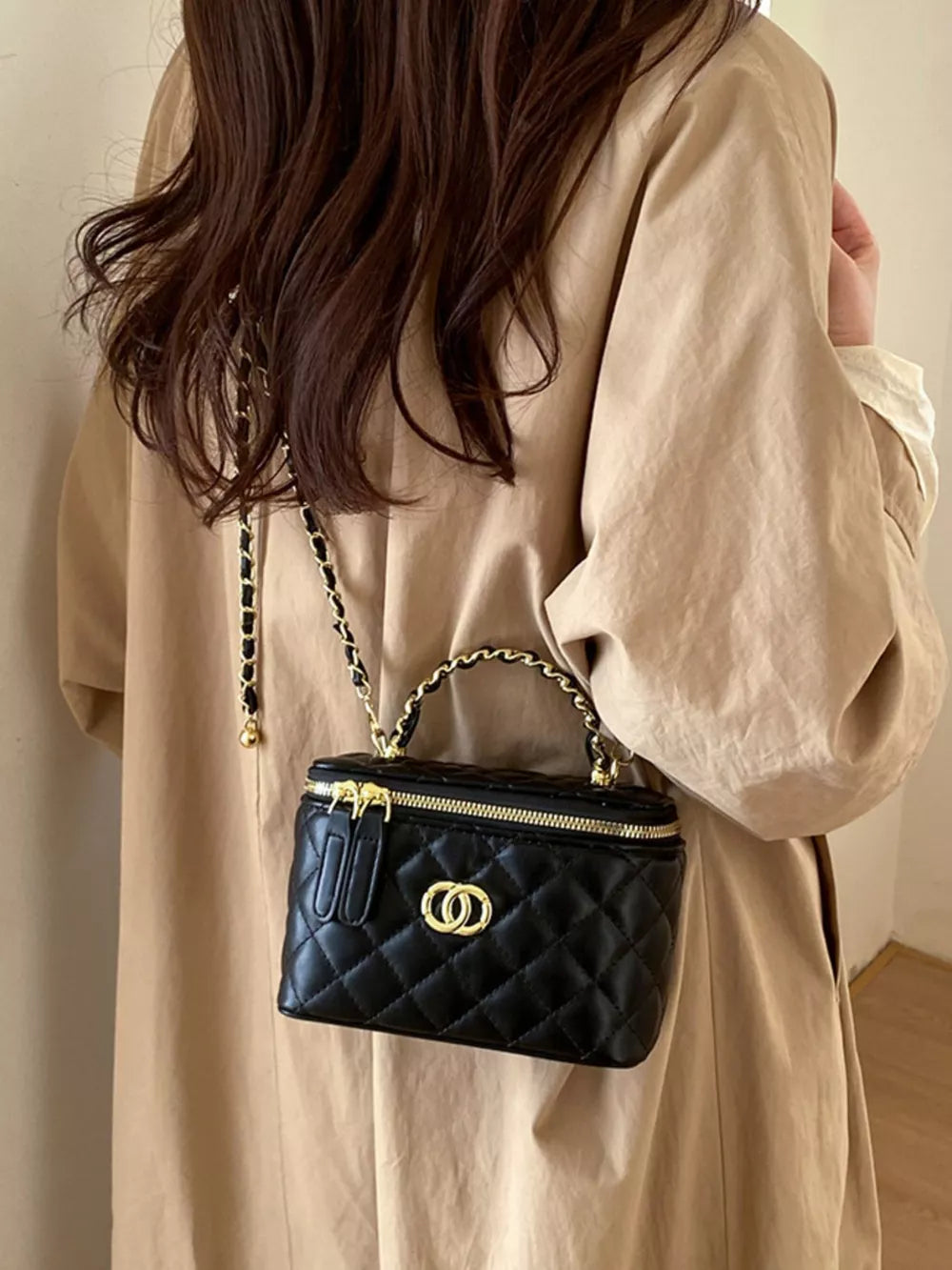 Quilted Leather Crossbody Bag in Black, front view