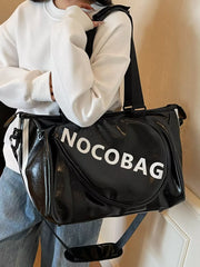 Black leather duffel bag with white text and side stripe detail