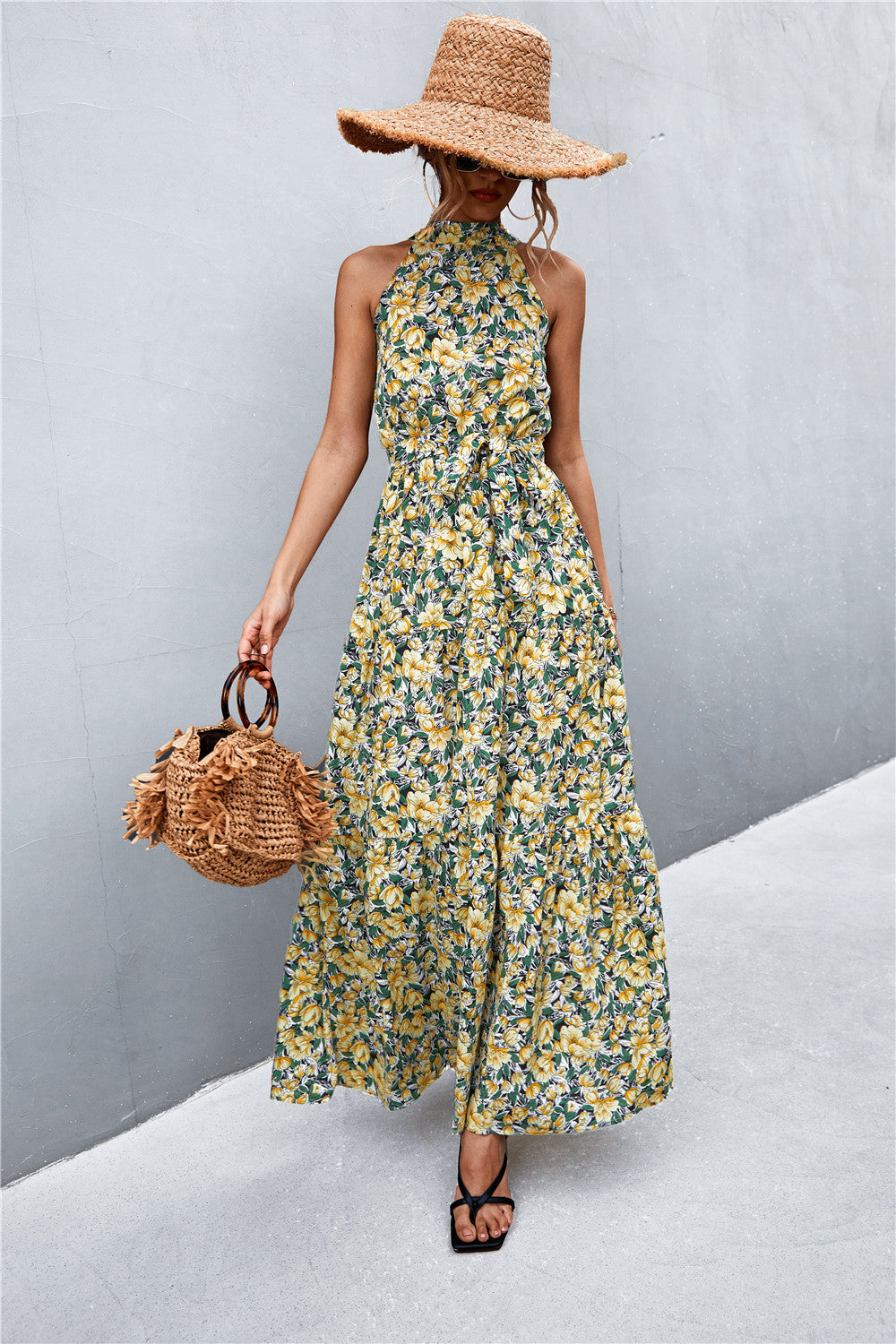 Yellow floral print halter neck maxi dress with tiered skirt