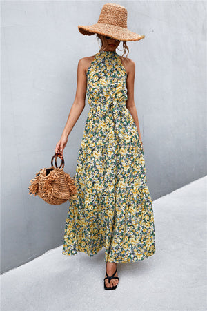 Yellow floral print halter neck maxi dress with tiered skirt