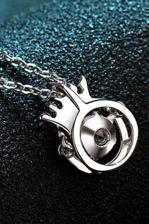 Silver pendant necklace with a crown design and a central crystal detail.