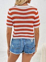 Open-knit striped crew neck top in orange and white with short sleeves.