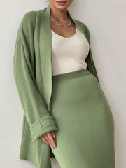 Ribbed knit co-ord set in Gum Leaf green with a long cardigan and midi skirt.