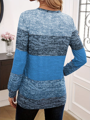 Marled stripe knit sweater in sky blue with button shoulder detail.