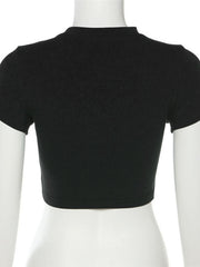 Black cropped t-shirt with crew neck and short sleeves.