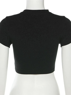 Black cropped t-shirt with crew neck and short sleeves.