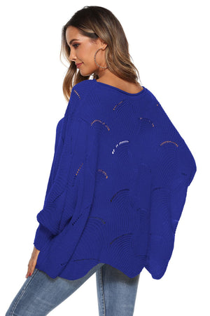 Royal blue openwork knit sweater with cocoon sleeves and boat neck.