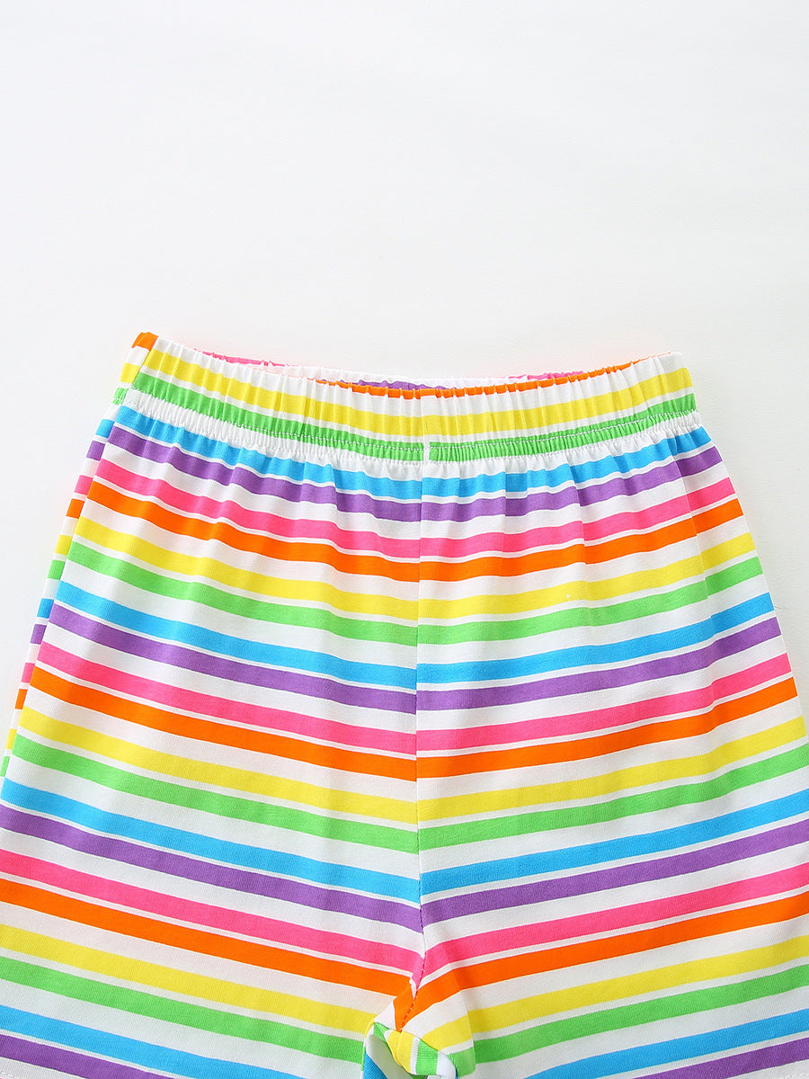 Baby girls' rainbow striped cotton shorts with elastic waistband.