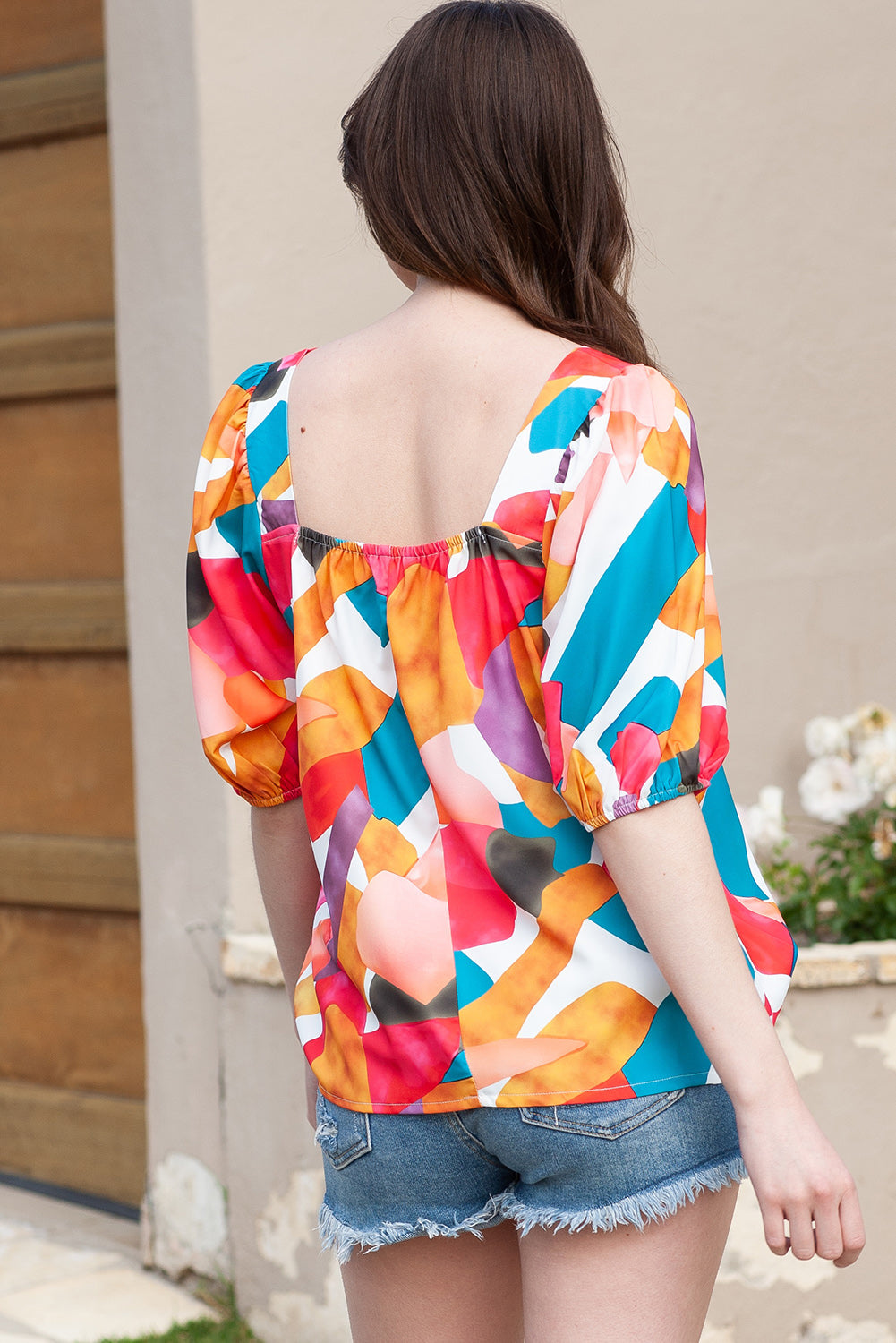 Abstract print puff sleeve blouse with square neckline in multicolor.