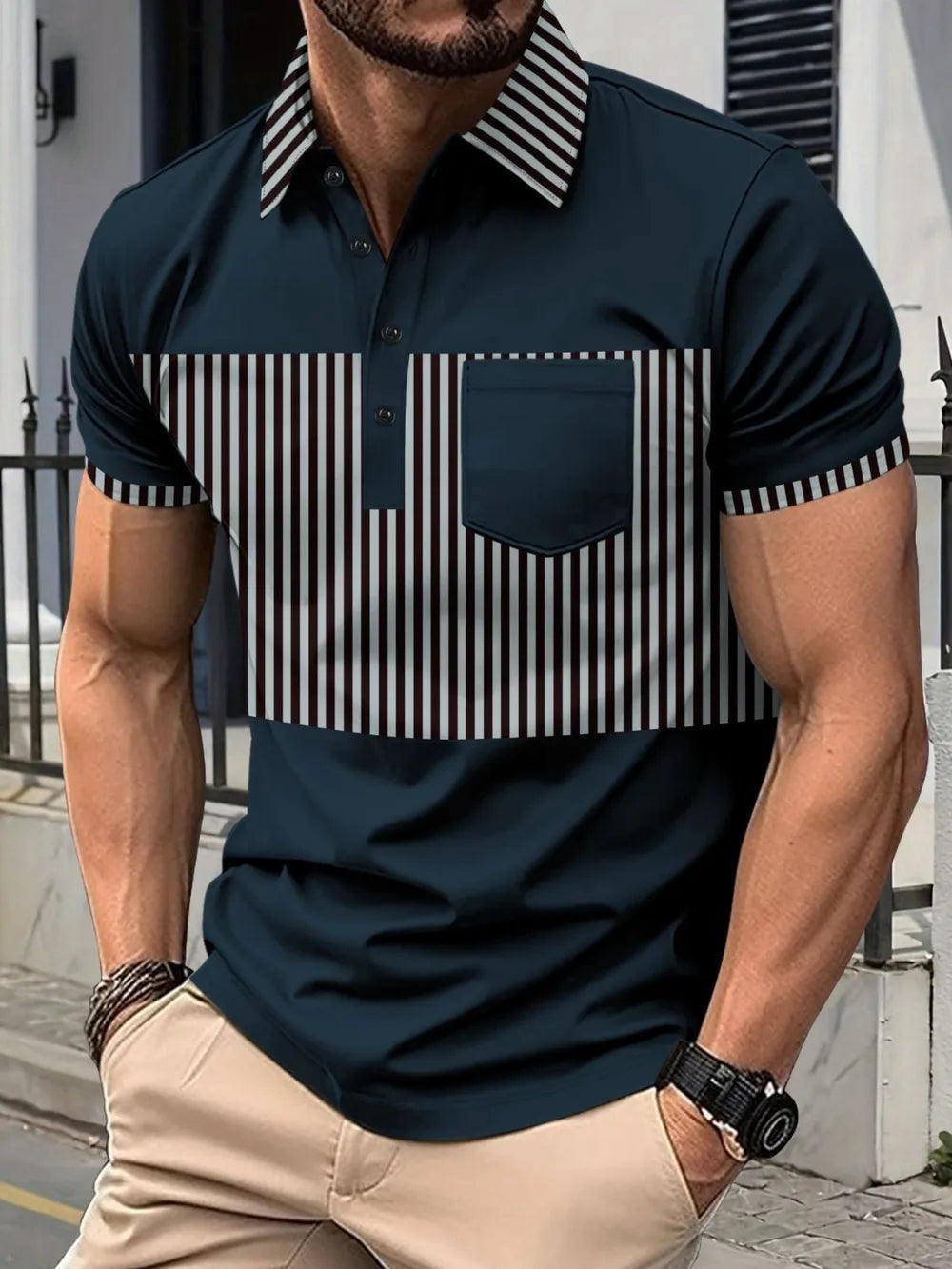 Navy polo shirt with vertical stripe panel and chest pocket.