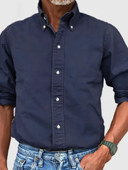 Navy Oxford button-down shirt with a relaxed fit and button-down collar.