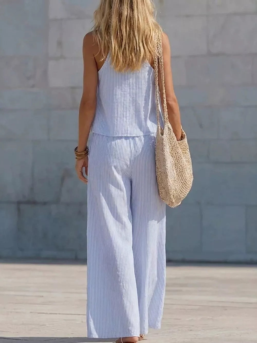 Sky blue striped two-piece set with wide-leg pants and cami top.