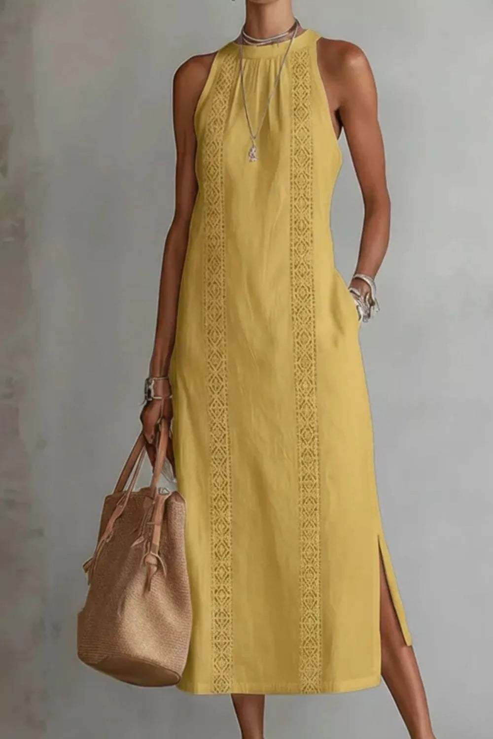 Elegant midi dress in gold with lace trim and pockets, sleeveless with a high neckline.