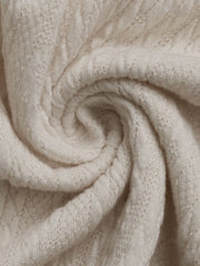 Cream textured knit henley top with subtle diamond pattern detail