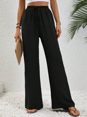 Black textured palazzo trousers with drawstring waist and wide leg