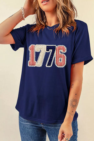 Navy cotton maternity t-shirt with patriotic 1776 appliqué and lace trim.
