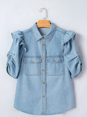Light wash denim button-down shirt with ruffled short sleeves and ruched cuffs.