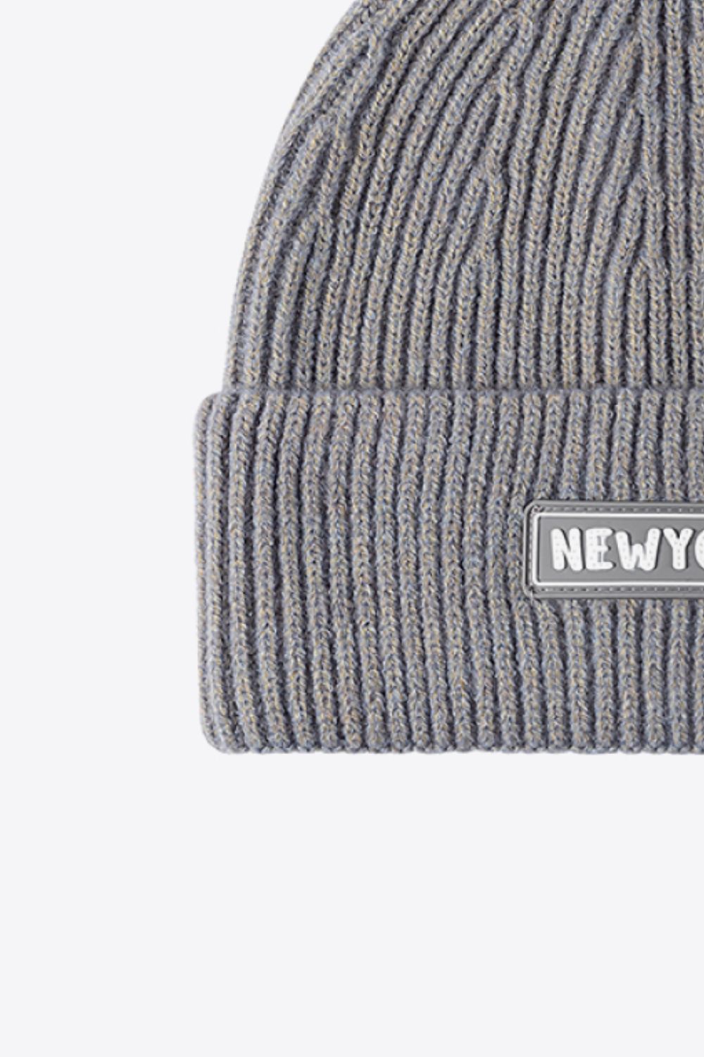 Gray ribbed acrylic beanie with a New York patch detail