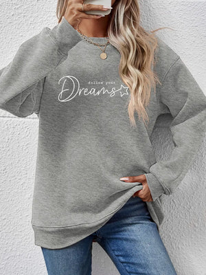 Dreams Scripted Oversized Sweatshirt in Charcoal with crewneck and long sleeves.