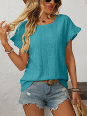 Teal eyelet knit blouse with ruffled short sleeves and a round neckline.