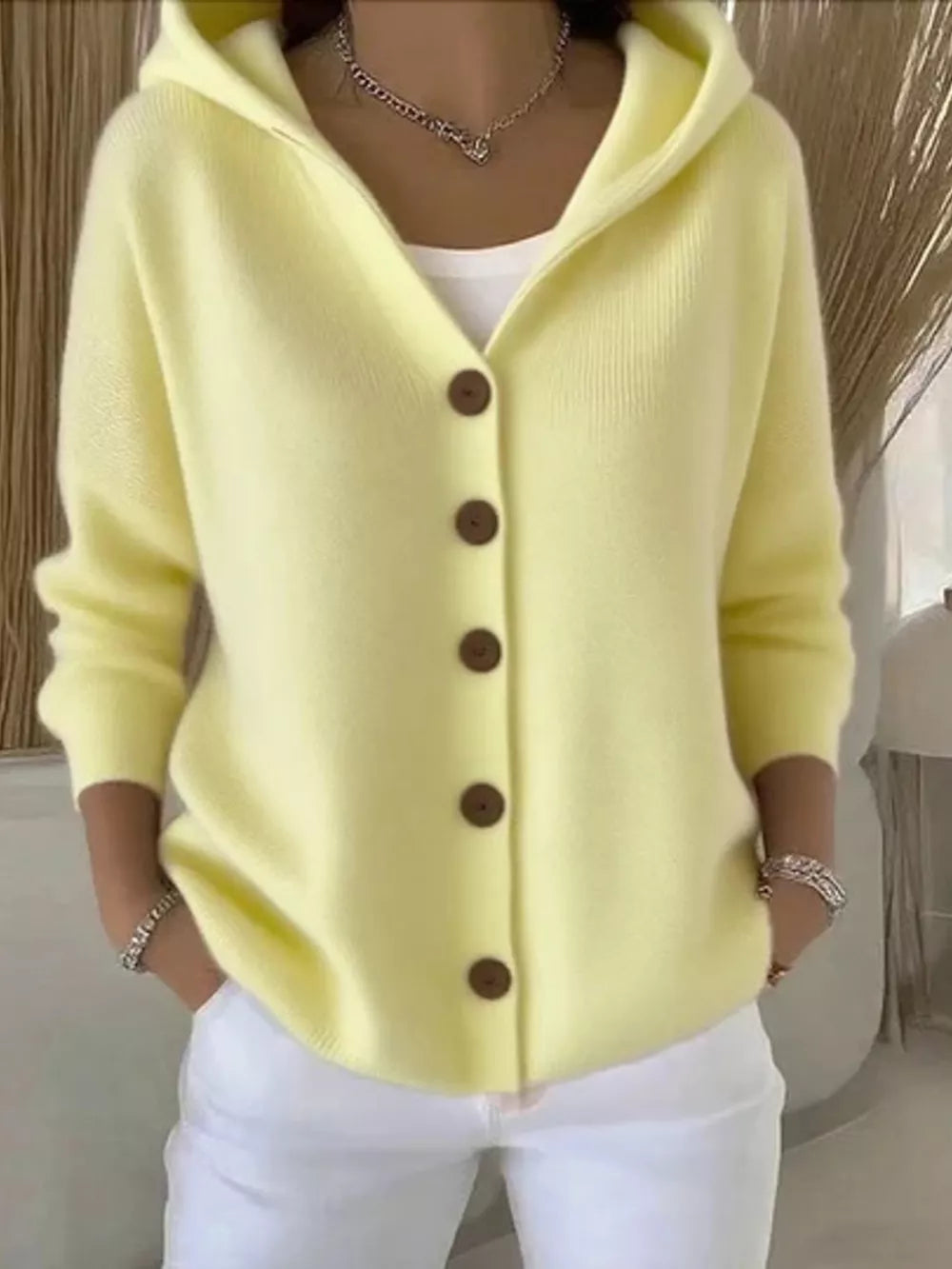 Yellow hooded button-front knit cardigan with wooden buttons, acrylic.