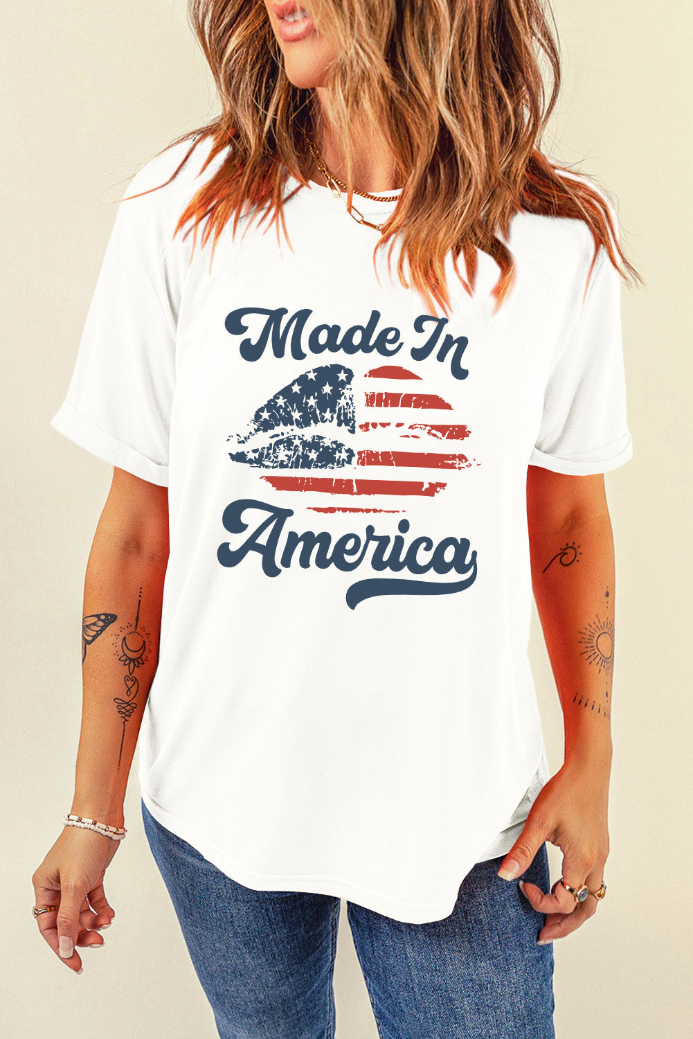 White t-shirt with distressed American flag graphic and "Made In America" text.