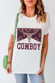 White t-shirt with a cowboy bull skull graphic and distressed "COWBOY" text.