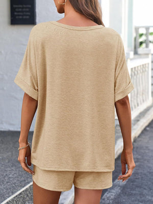 Tan relaxed fit tee with cuffed short sleeves and matching shorts.