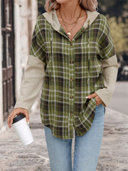 Colorblock plaid hooded shirt jacket in matcha green with contrasting beige sleeves and drawstring hood.