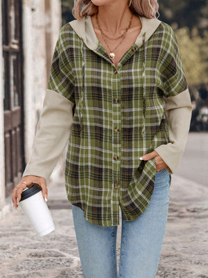 Colorblock plaid hooded shirt jacket in matcha green with contrasting beige sleeves and drawstring hood.