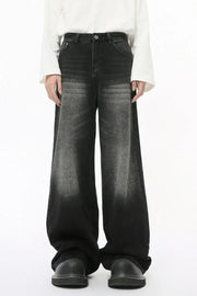 Black faded wash balloon leg jeans with a wide silhouette.