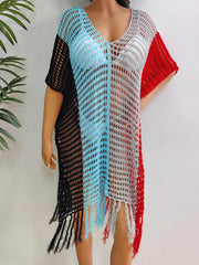 Colorblock crochet cover-up with fringe in black, blue, gray, and red.