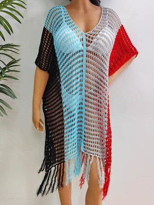 Colorblock crochet cover-up with fringe in black, blue, gray, and red.