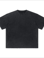 Black oversized tee with distressed details and washed effect, 100% cotton.
