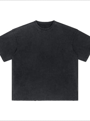 Black oversized tee with distressed details and washed effect, 100% cotton.
