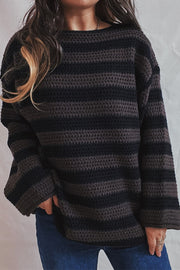 Black and khaki striped boat neck knit sweater with a textured stitch.