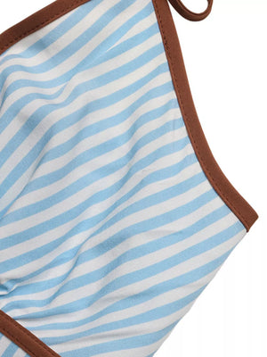 Chic striped halter neck romper in blue and white with brown trim.