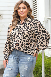 Leopard print blouse with blouson sleeves and collared neckline.