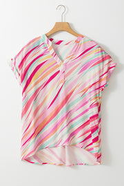 Prismatic stripe henley blouse in blush pink with a v-neck and rolled short sleeves.